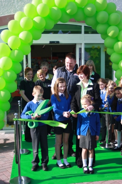 Competition Winners Cutting The Ribbon
