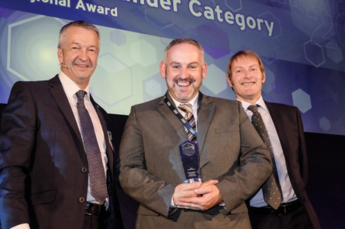 Barry Receiveing his award